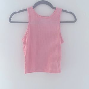 Light pink short but not cropped tank top.